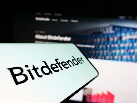 Stuttgart, Germany - 12-30-2022: Smartphone with logo of Romanian cybersecurity company Bitdefender on screen in front of business website. Focus on center of phone display.