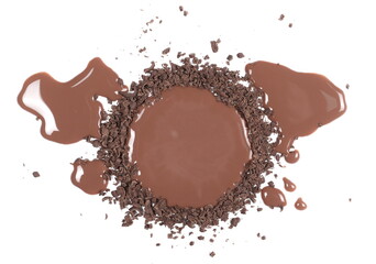 Spilled chocolate milk puddle with  chopped, milled dark chocolate isolated on white background, top view