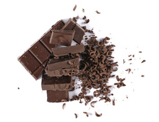 Chopped, milled chocolate pile with shavings isolated on white, top view