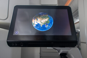 The globe on the display of the passenger monitor in the plane