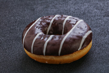 Glazed sweet tasty chocolate donut