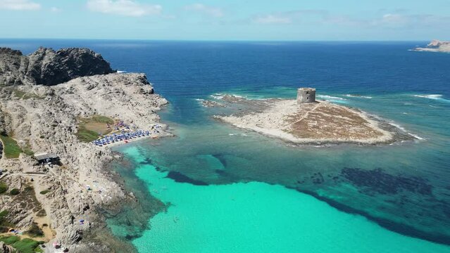 La Pelosa Island, Spiaggia della Pelosetta Beach and turquoise blue sea in Sardinia, Italy - 4k Aerial
