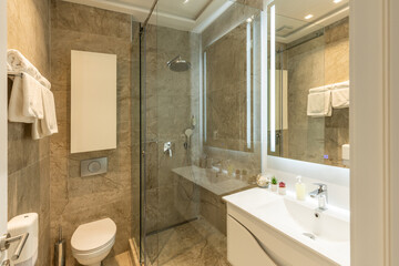 Bathroom interior with glass shower cabin