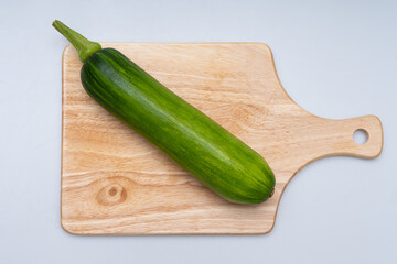 Fresh green(young)pumpkin on a white background
