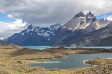 Naklejka na ściany i meble Torres del Paine surrounded by water
