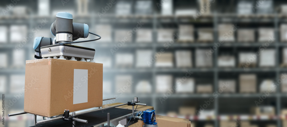 Poster robot arm moves boxes in an automatic warehouse. concept