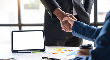 Close up of Business people shaking hands, finishing up meeting, business etiquette, congratulation, merger and acquisition concept