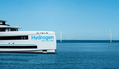 A hydrogen fuel cell yacht on a background of wind turbines at sea. Concept