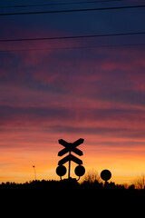 railway crossing in sunset