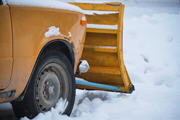 Passenger car has been converted into snowplow.