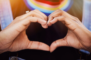 LGBTQ, pride and hands with a heart sign for love, equality and solidarity of a gay woman. Rainbow,...