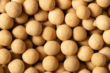 Fototapeta na wymiar Brown Soy-covered Chickpeas with sauce texture background, traditional turkish coated nut 