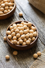 Brown Soy-covered Chickpeas with sauce in wooden bowl, traditional turkish coated nut 