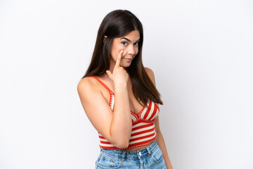 Fototapeta premium Young Brazilian woman isolated on white background showing something