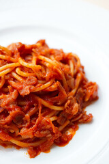 Pasta Amatriciana with Italian bacon and traditional tomato sauce 