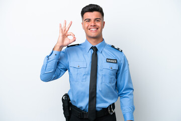 Young police caucasian man isolated on white background showing ok sign with fingers