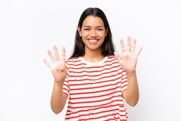 Young Colombian woman isolated on white background counting nine with fingers