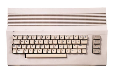 vintage cream colored home computer keyboard isolated on white
