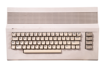 vintage cream colored home computer keyboard isolated on white
