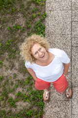 attractive mature woman with curly hair
