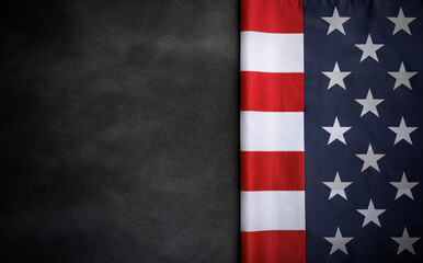 USA American flag on worn darck background. Image suitable for Patriotic concept, USA Memorial day, Labor day, 4th of July or Veteran's day celebration.