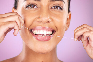 Woman portrait, face or flossing teeth on studio background in hygiene mouth maintenance, self care...