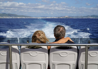heterosexual couple on a ship in the sea. rear view. Valentine's day