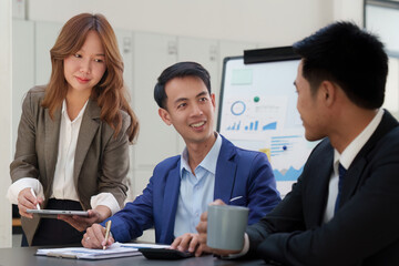 Financial analyst analyzes business people investment consultant analyzing company financial report working with documents graphs. Stock Market Tax Fund Finance concept