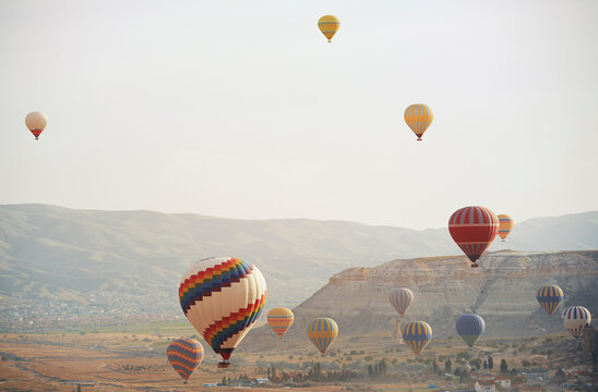Fototapeta Hot air balloons flying over Cappadocia