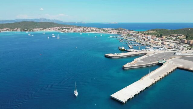 Golfo Aranci Port and docks in Sardinia, Italy - 4k Aerial Forward