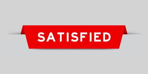 Red color inserted label with word satisfied on gray background