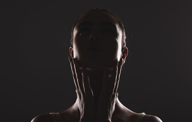 Woman, beauty and face silhouette in dark fantasy, cosmetics and dream aesthetics. Shadow, black...