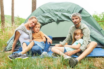 Parents spending leisure time with kids in summer