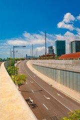Traditional Mediterranean coastline modern architecture in Barcelona at summer sunny hot day and blue sky during warm sunset colors.
