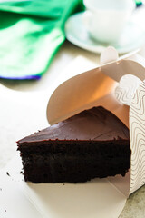 Austrian chocolate cake, Sacher torte in cake box 
