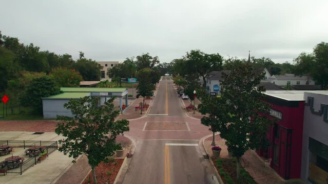 Aerial view of an empty and abandoned downtown Ocoee, Florida.  Ocoee is a family oriented town with restaurants, breweries, bars, and shopping.