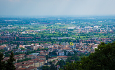 Fototapeta na wymiar Aerial view over the city of Bergamo from San Vigilio mountain. Overlooking the city of Bergamo.