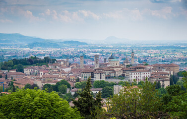 Fototapeta na wymiar Aerial view over the city of Bergamo from San Vigilio mountain. Overlooking the city of Bergamo.