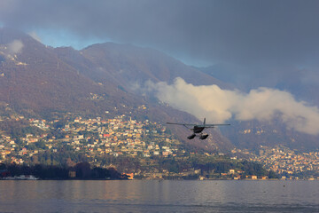 idrovolante sul lago di como in italia, hydroplane on lake of como in italy
