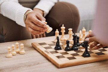 People, playing hands or chess knight on house, home or living room table in strategy board game,...