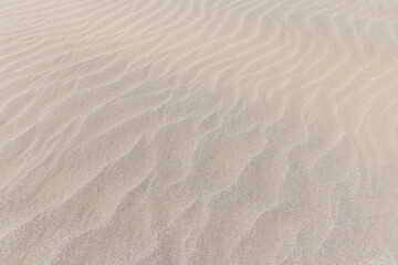 Fototapeta na wymiar Sea sand beach pattern texture