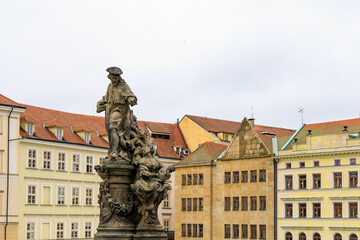 Ancient medieval sculptures on the Charles Bridge. Background with selective focus