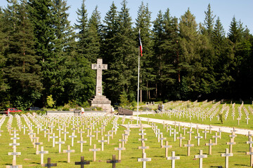 WW2 cemetery.Rows of white crosses at WWII cemetery in France. French war memorial.Large cemetery in full sun