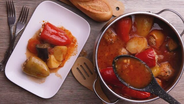 colorful stuffed peppers in red sauce