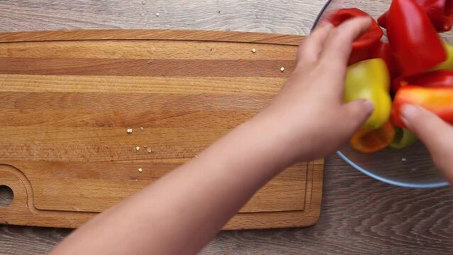 prepare sweet peppers for stuffing remove seeds and partitions