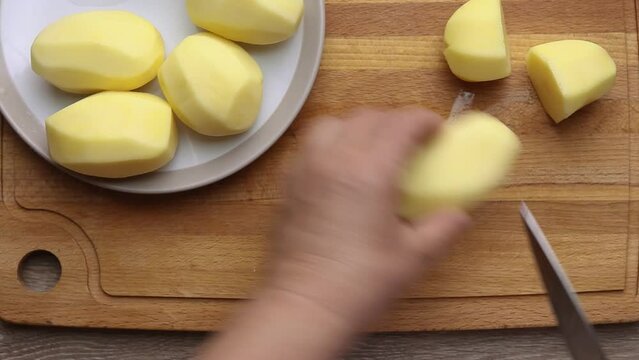 chop the peeled potatoes into large chunks with a kitchen knife