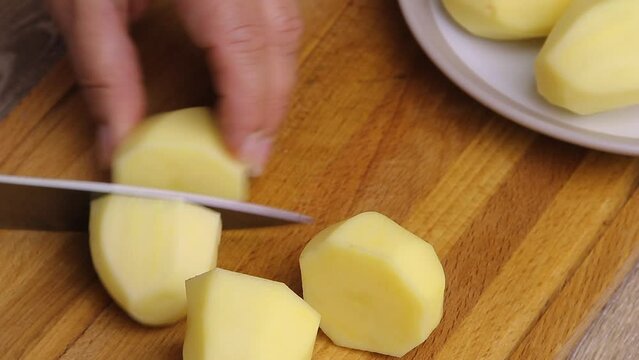chop the peeled potatoes into large chunks with a kitchen knife