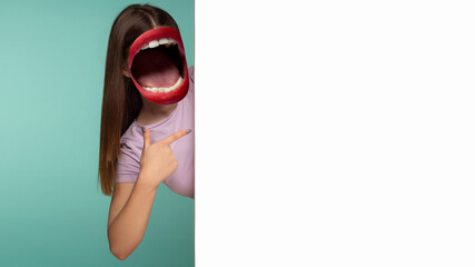 Contemporary art collage. Inspiration, idea, trendy urban magazine style. Composition with young girl headed of female mouth pointing a white billboard