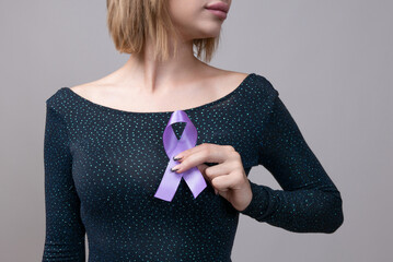 Woman holding a purple ribbon in her hands ADD,ADHD,Alzheimer Disease ,Arnold Chiari Malformation,Childhood Hemiplegia stroke, Epilepsy, Chronic Acute Pain,Crohns
