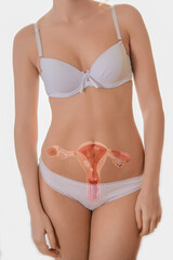 beautiful young woman in white lingerie with hologram reproductive system